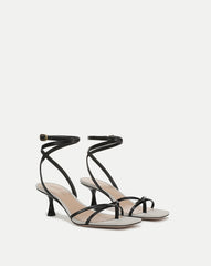 Caterina Leather Ankle-Wrap Sandal in Black