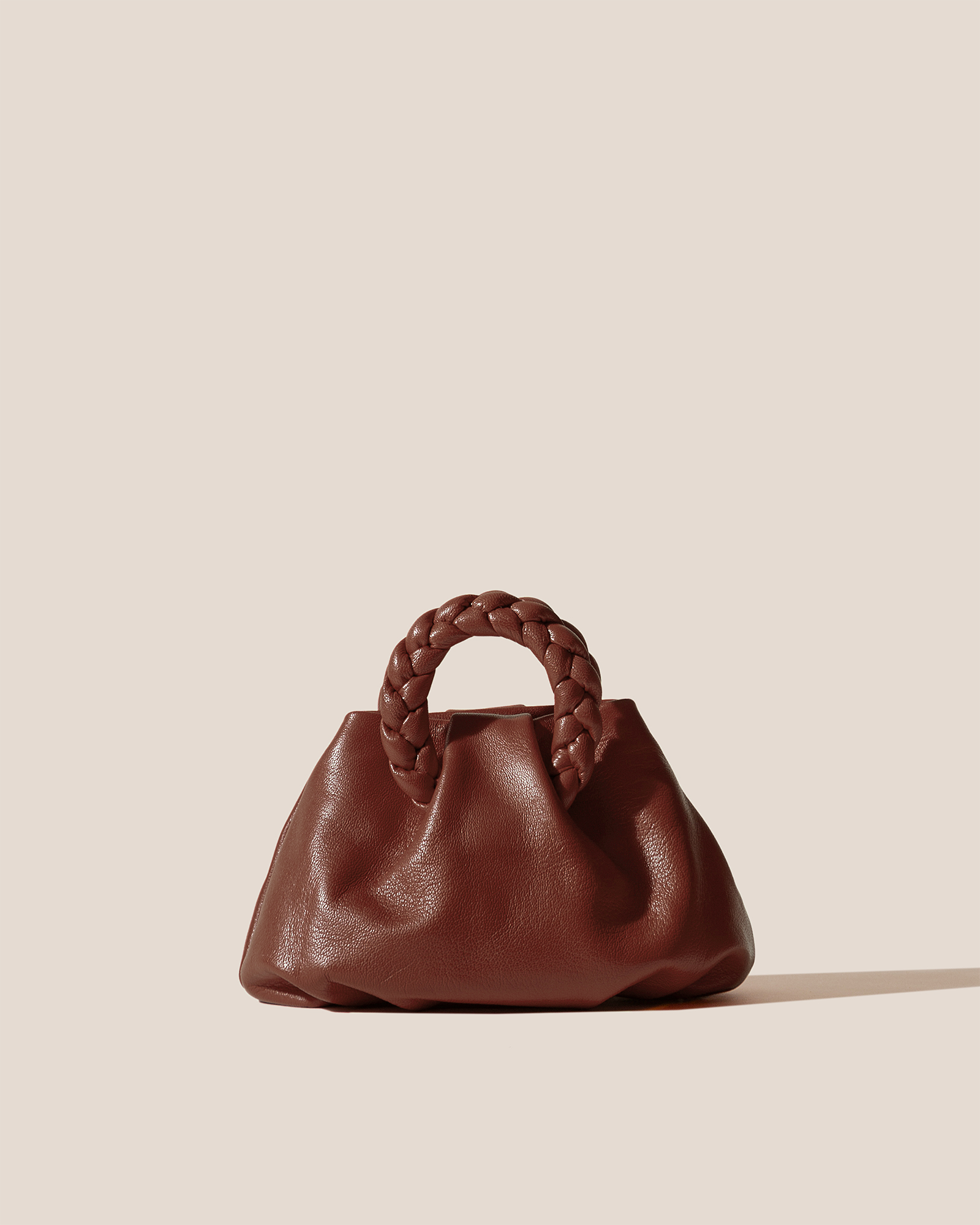 BOMBON SUPPLE SHINY - Plaited-handle Leather Handbag