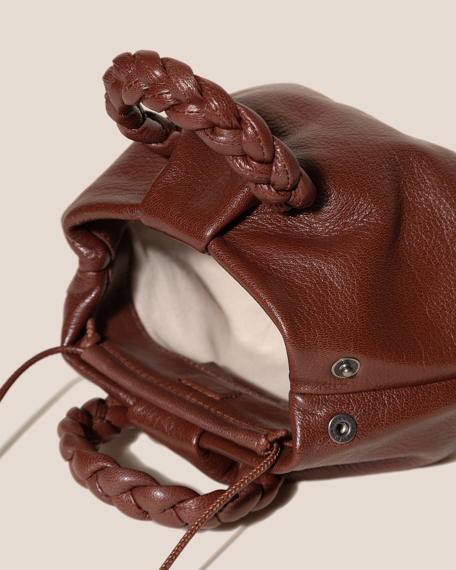 BOMBON SUPPLE SHINY - Plaited-handle Leather Handbag