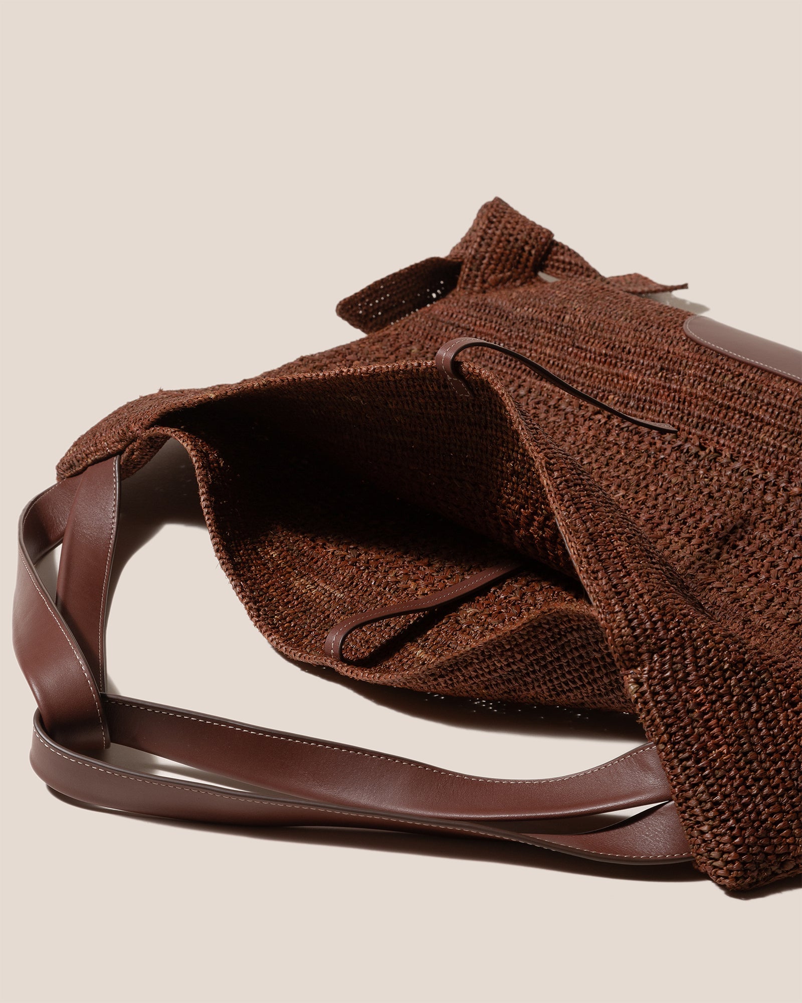 CADOR - Slouchy Crocheted Raffia Shoulder Bag
