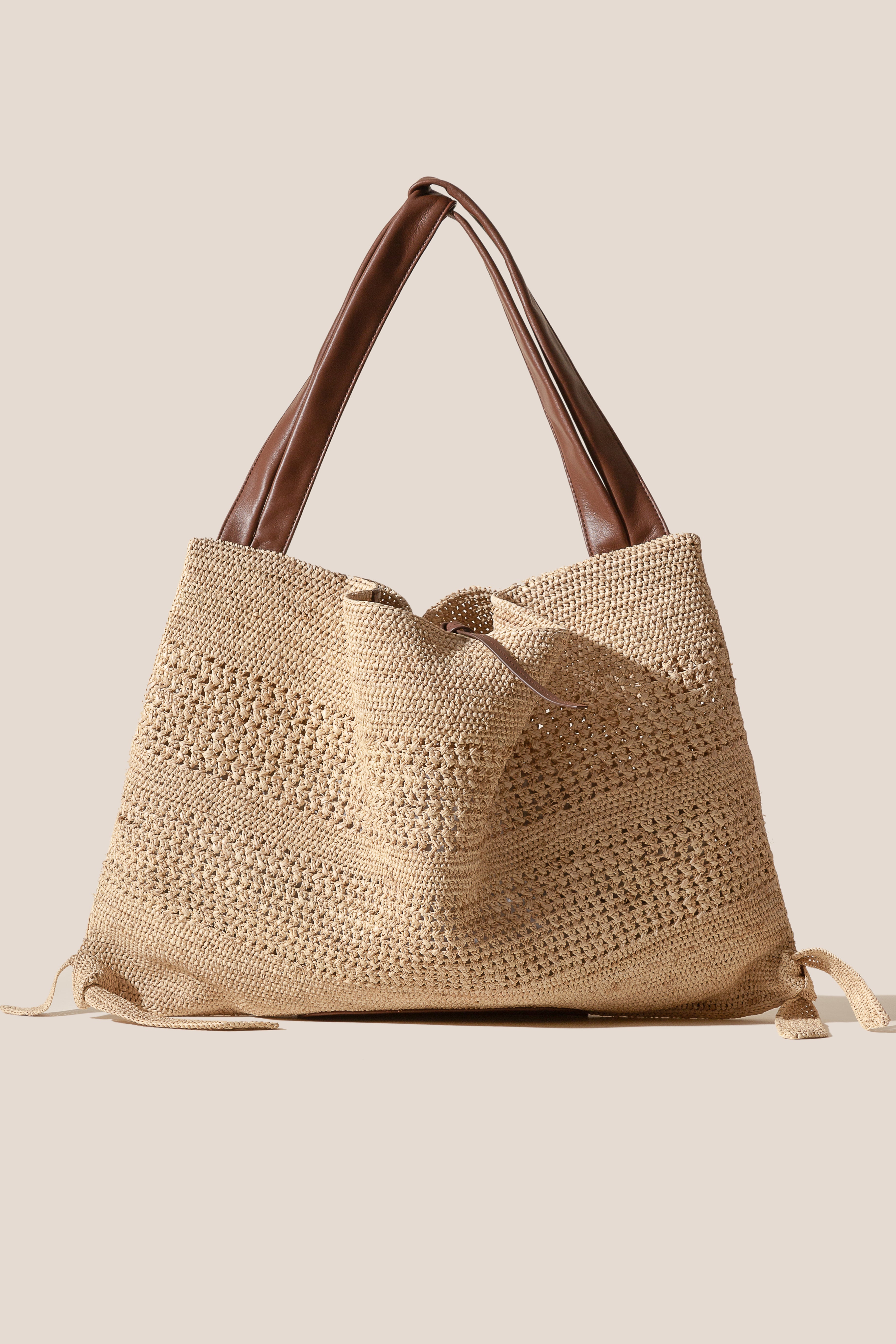 CADOR - Slouchy Crocheted Raffia Crocheted Shoulder Bag