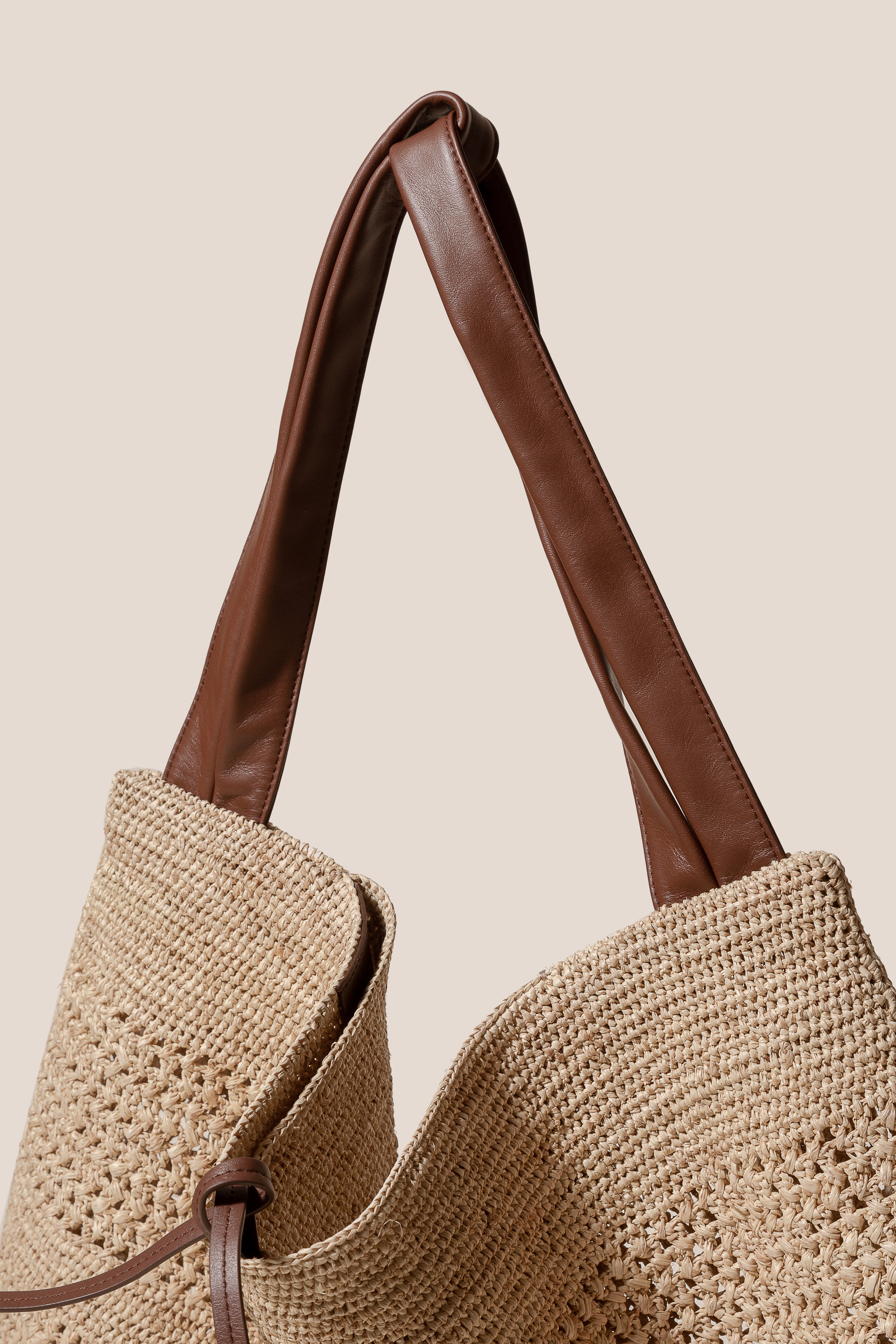 CADOR - Slouchy Crocheted Raffia Crocheted Shoulder Bag