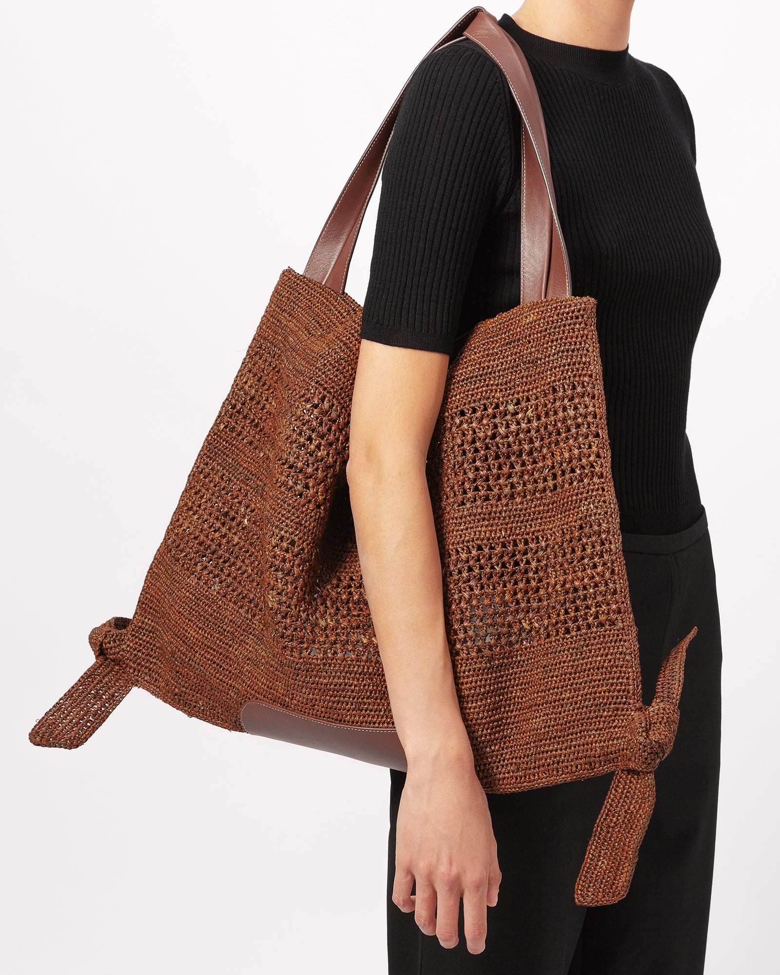 CADOR - Slouchy Crocheted Raffia Crocheted Shoulder Bag